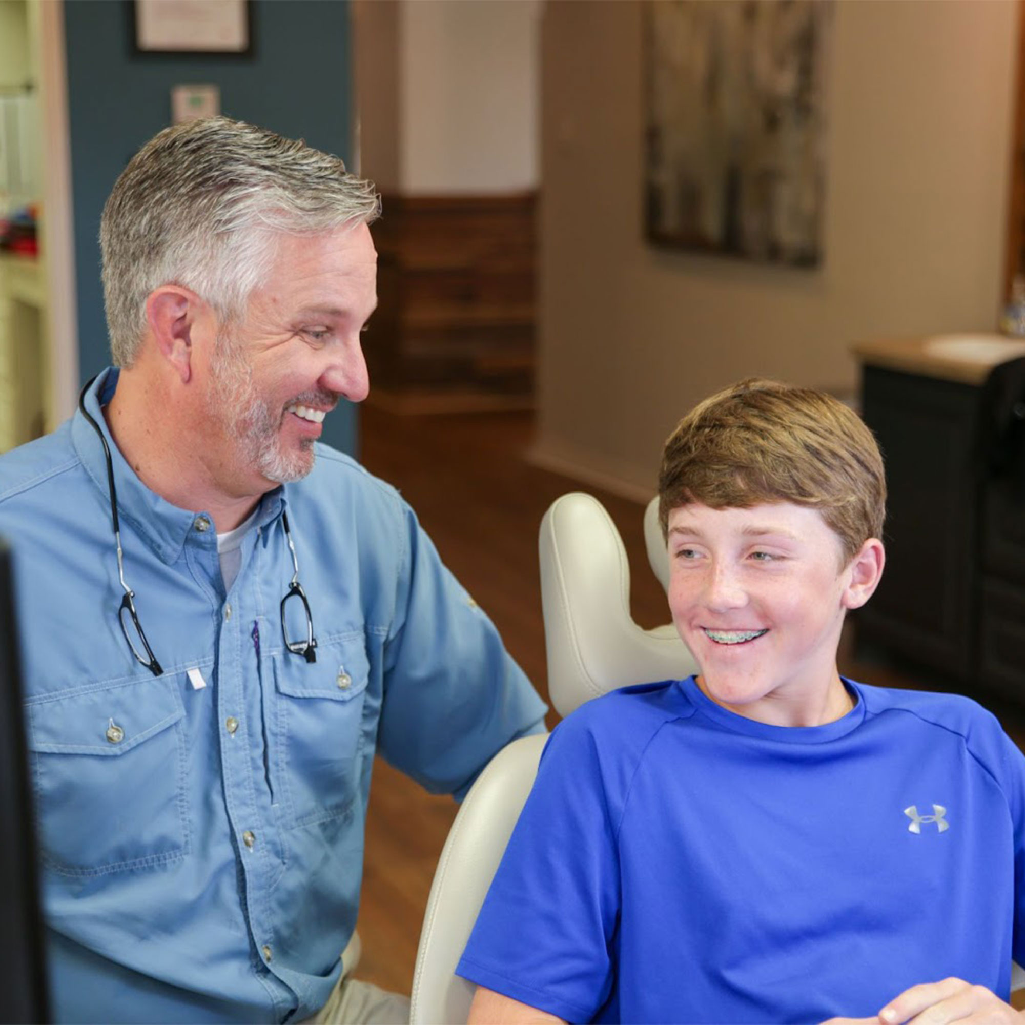 teen patient smiling with doctor